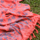The Sweet Cosmos - Pink sarong from YUMI & KORA is used as a picnic blanket at a grassy park