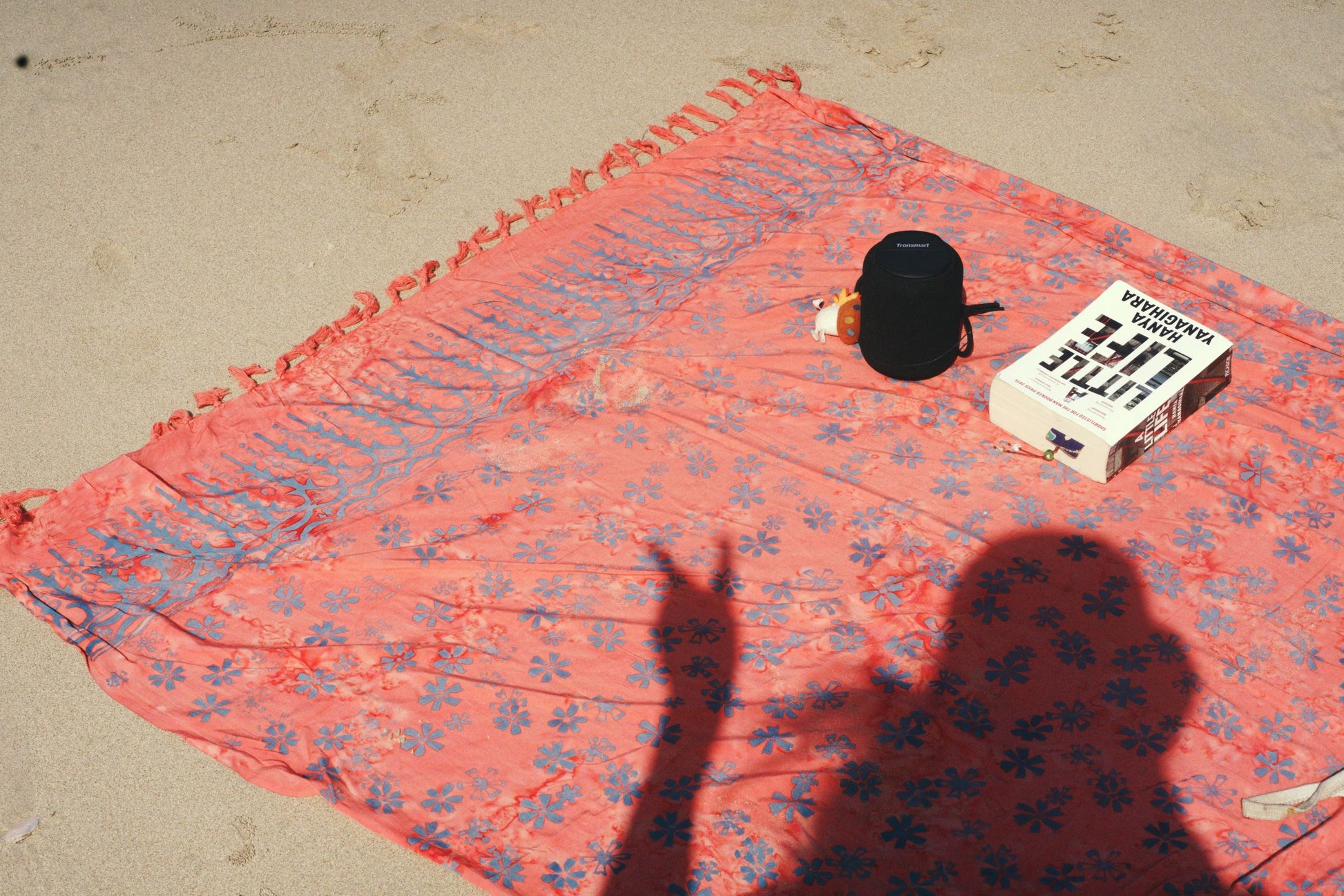 The Sweet Cosmos - Pink sarong from YUMI & KORA is used as a beach towel